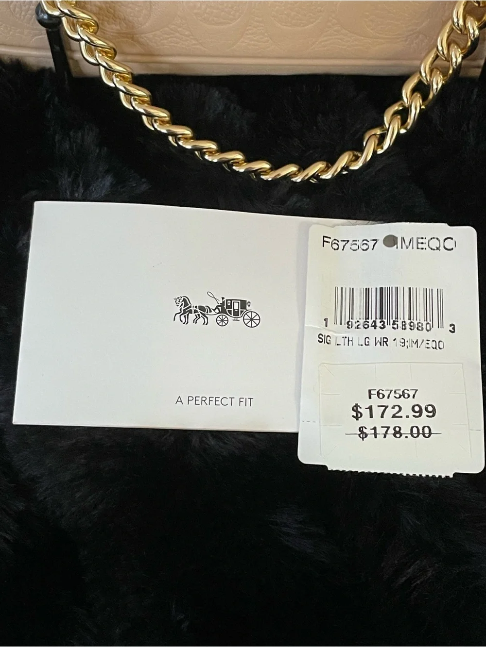 COACH Ivory Embossed Signature C Pebble Leather Large Wristlet F67567